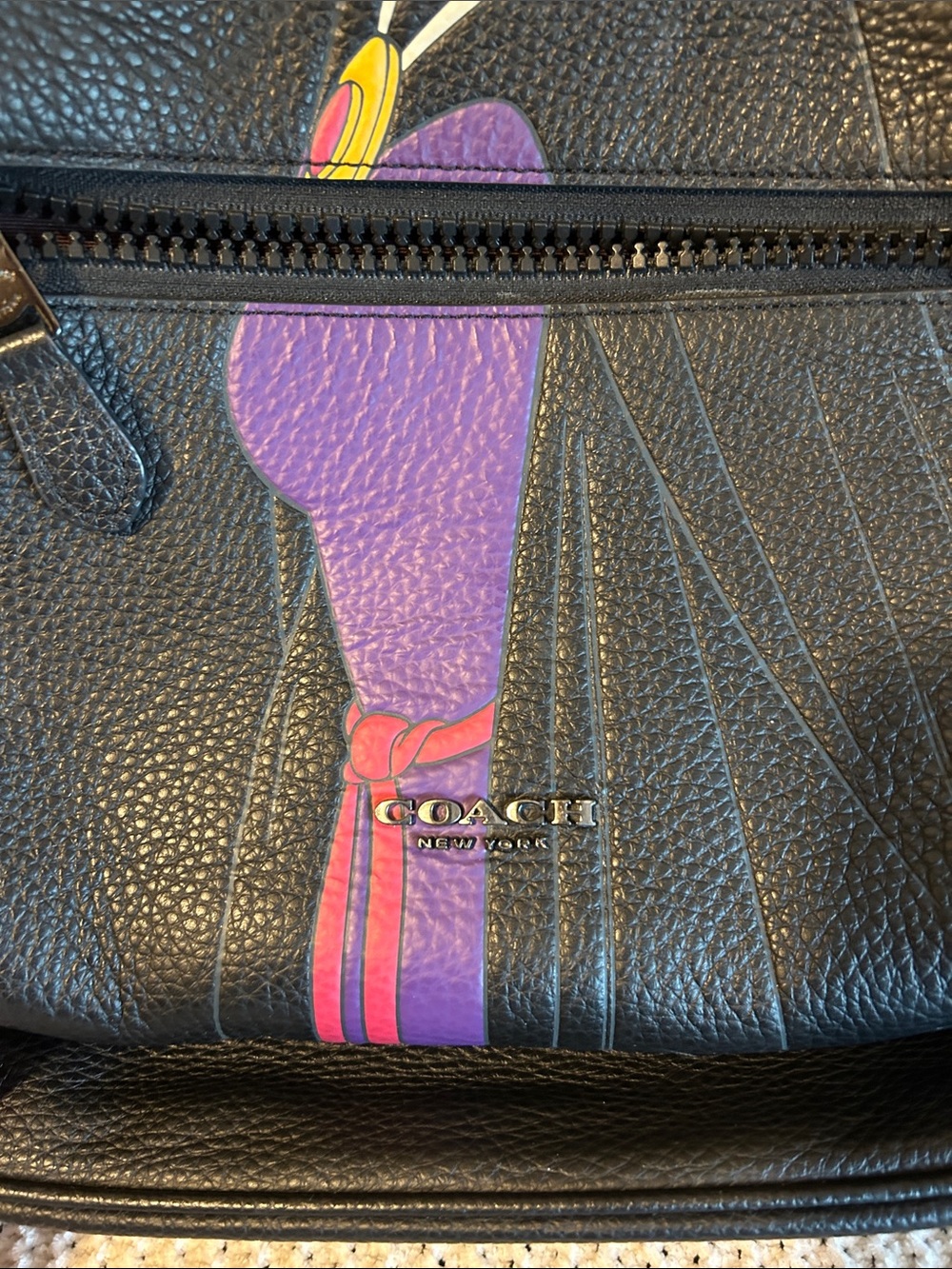 Coach Black Leather Backpack with Evil Queen Graphic and Purple Accents - Picture 2 of 7